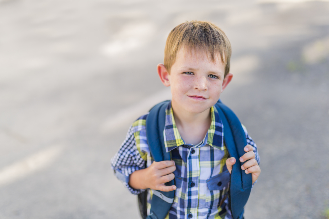 A pre-school student going to school on the playground